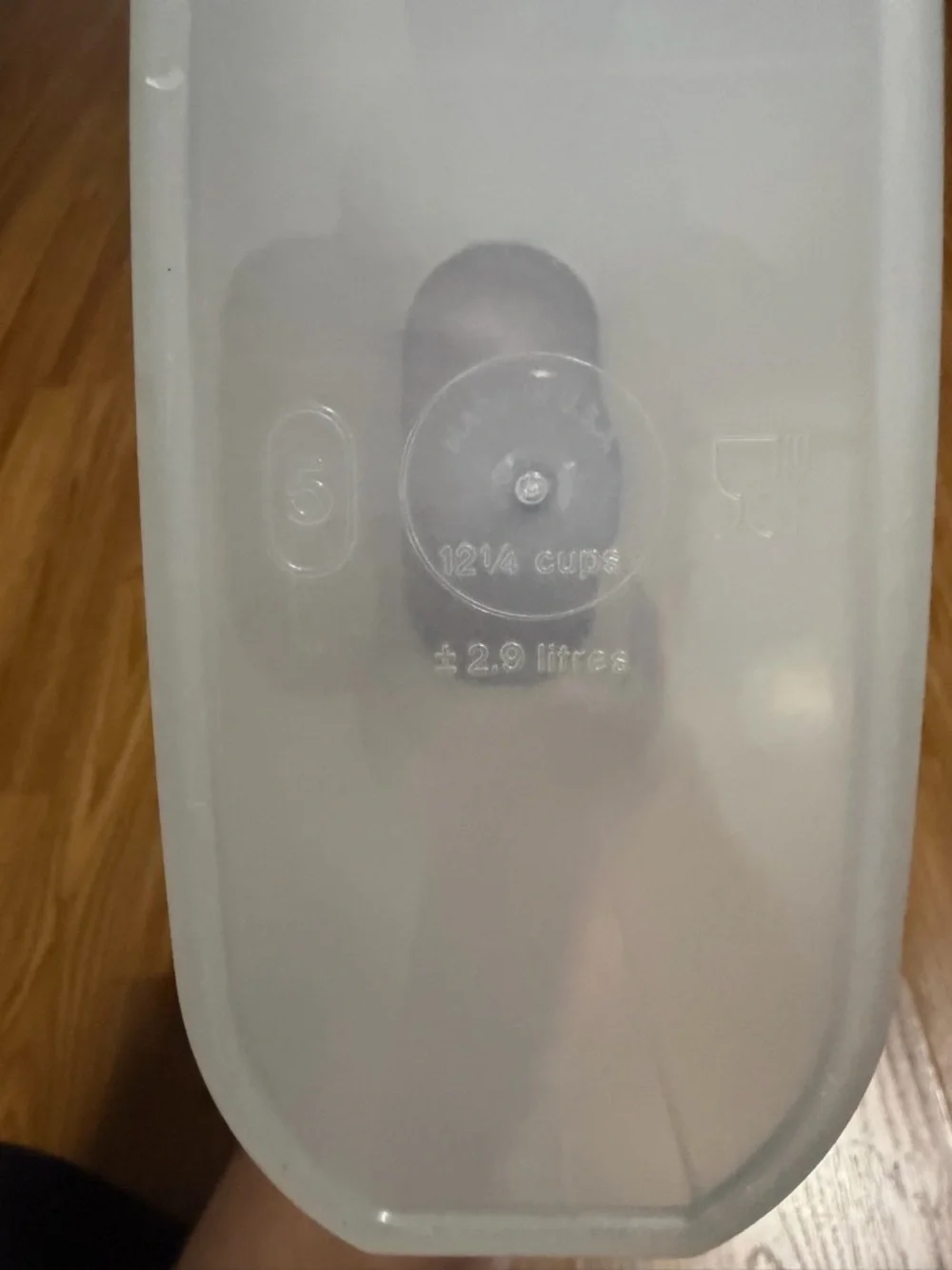 VTG Tupperware Modular Mates Oval 5 container with a brown seal lid.